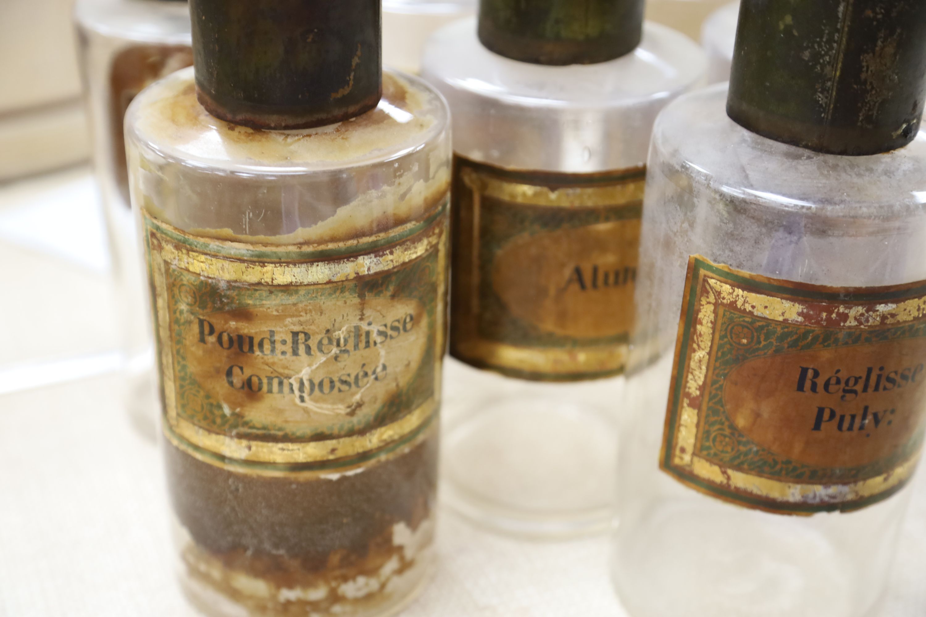 Seven vintage French glass pharmacy jars